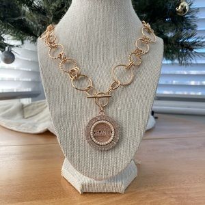 Authentic Chanel button used to create a new necklace